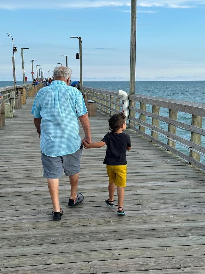 Boy fishing on Topsail Island | Ward Realty