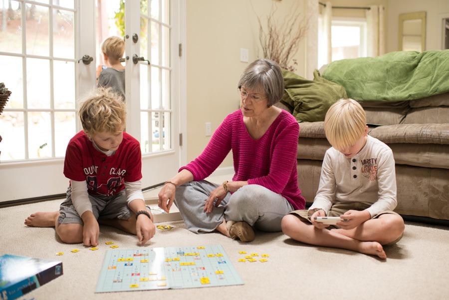 grandmother reading to her grandchild | Ward Realty Topsail Island