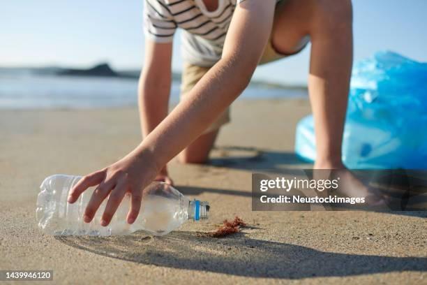 child with beach in a bottle | Ward Realty Topsail Island