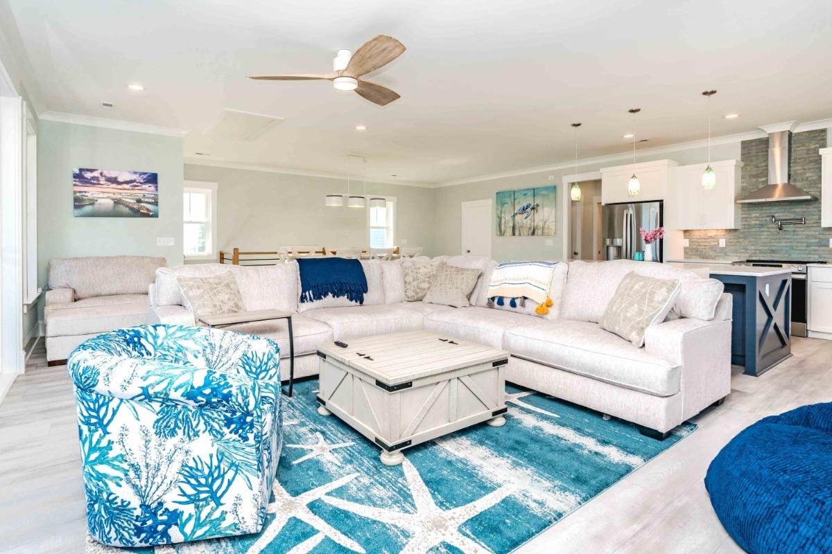 woman giving party host a gift | Ward Realty